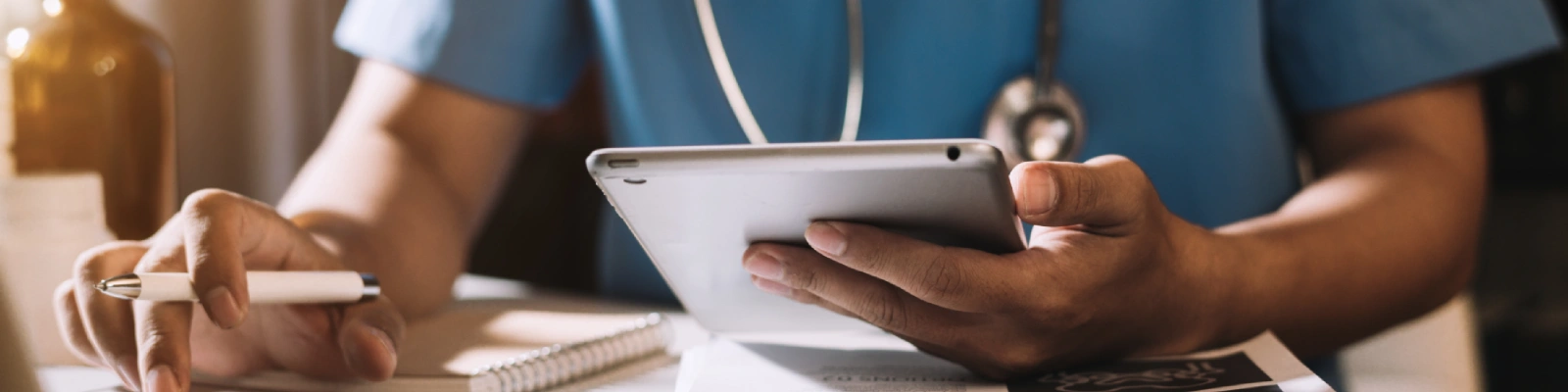 doctor holding a tablet